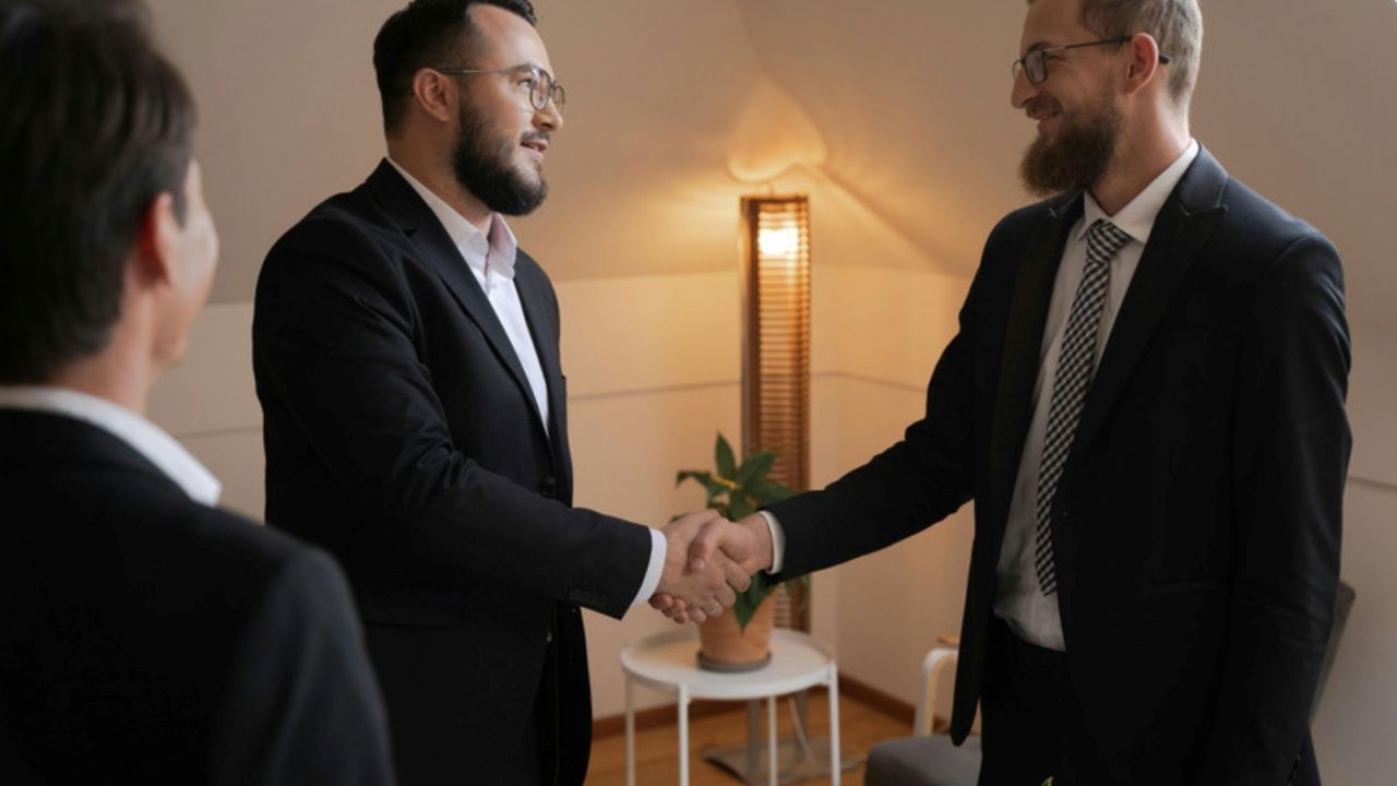 Business owner negotiating sale to a listed company