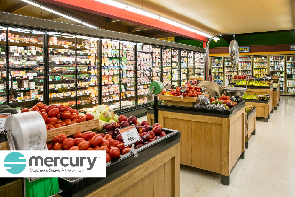 Supermarket fridge are with fresh produce bins in front